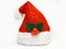 Single shimmering Santa Claus red hat with mistletoe isolated on white background