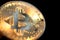 Single shiny bitcoin coin.  Wealth, digital, virtual, currency, and cryptocurrency concept