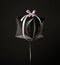 Single silver present gift box balloon ballon object with pink stripe for birthday or valentines day on dark gray