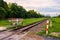 single straight railway with mountain and sunrise