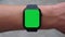 Single Tapping a Green Screen Smartwatch