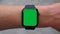 Single Tapping a Green Screen Smartwatch