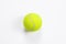 Single tennis ball isolated white background. Top view