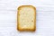 Single toast over white wooden background,