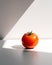 A single tomato sitting on a white surface. AI generative image.