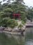 A single torii gate on an island in Matsushima, Japan.