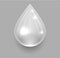Single transparent water drop on grey background
