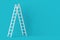 Single white stepladder against pastel blue wall minimal career, opportunity or goal concept