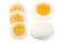 Single whole boiled egg with halved egg isolated on a white background. Top view