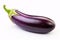 Single whole raw eggplant vegetable on white background