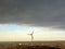 Single wind turbine standing on the Hoppenbruch heap in the city of Herten, Germany. Looming rain clouds over the Ruhr Metropolis.