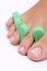 Single woman foot with pedicure tool