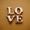 Single word `love` in gold lettering