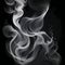 a singular intricately flowing different colored smoke stream against either a black or white background.