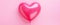 Singular Love: A Pink Heart Balloon Adorns a Gentle Wall - Valentine's Charm by Generative AI