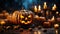 Sinister Halloween composition in dark tones. Spooky pumpkin jack-o-lanterns, burning candles, beads, blurred background