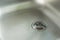 A Sink With Chrome Drain Strainer / Sink Strainer