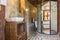 Sink and Faucet in Toilet of Country Loft Interior Design Room