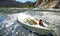 Sinking boat with teddy bear