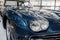 SINSHEIM, GERMANY - OCTOBER 16, 2018: Technik Museum. Front wheel, hood and bumper of luxury blue rare vehicle on the