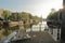 Sint Antoniesluis lock, overlooking Oudeschans canal, with reflections. Picture taken early morning with sun rays and sun star