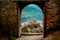 Sion, Switzerland: Medieval Valere basilica seen through main gates of Tourbillon Castle located in canton Valais