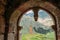 Sioni, Georgia. Ancient Old Stone Watchtower On Mountain Background In Sioni Village, Kazbegi District, Mtskheta