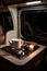 A sip of coffee, a moment of bliss, as the motorhome becomes a sanctuary amidst the chaos of the world