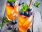 Sip of Serenity: Mini Peach Tea with Ice, Mint, and Blueberry - A Vegan Delight