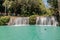 SIQUIJOR, PHILIPPINES - FEBRUARY 9, 2018: People enjoy Cambugahay Falls on Siquijor island, Philippine