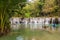 SIQUIJOR, PHILIPPINES - FEBRUARY 9, 2018: People enjoy Cambugahay Falls on Siquijor island, Philippine