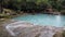 SIQUIJOR, PHILIPPINES - FEBRUARY 9, 2018: People enjoy Cambugahay Falls on Siquijor island, Philippines.