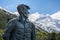 Sir Edmund Hillary Statue looking towards Mount Cook peak, New Zealand