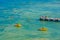 Sirmione, Italy, August 26, 2021: People are enjoying a sunny day at pier at Lido delle Bionde beach at Sirmione, Italy