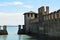 Sirmione Scaliger Castle with moat, rare example of medieval port fortification, Sirmione, Lake Garda, Italy
