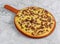 Sisig Super Special pizza with tomatoes, cheese fast food ready to eat on marble background top view