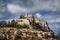 Sisteron Citadel, fortifications and rooftops with clouds. Southern Alps, Franc