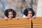 Sisters on bench swing