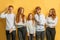 Sisters, brothers with natural red hair posing at camera