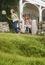 Sisters With Fishing Nets Running At Yard