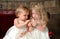 Sisters Holding Flower