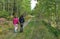 Sisters walking in forest