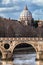 Sisto Bridge and the dome of Saint Peter. Rome Italy