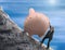 Sisyphus metaphor man trying to push giant piggy bank up a mountain