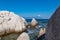 Sithonia - Rock formation with scenic view of holy Mount Athos from Fava sand beach near Vourvourou, Greek peninsula Sithonia