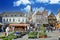 Sittard, Netherlands - March 25. 2022: View on traditional local farmer market square in ancient town, colorful old buildings on s