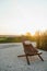 Sitting Area Beside a Wine Country Home, Shaded Wooden Lounge Chairs sit beside a relaxing Hammock Swing