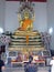 The sitting Buddha statue sheltered by Naga (dragon snake) at Wat Pho