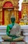 Sitting Emerald Buddha golden statue in thai Doi Suthep temple