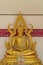 The sitting gold buddha statue